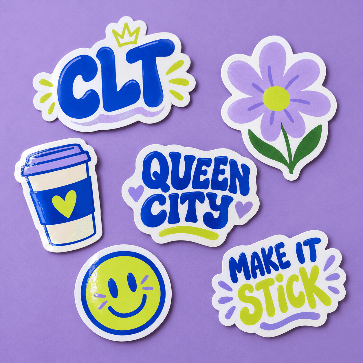 Illustrative assortment of colorful Charlotte-inspired vinyl stickers